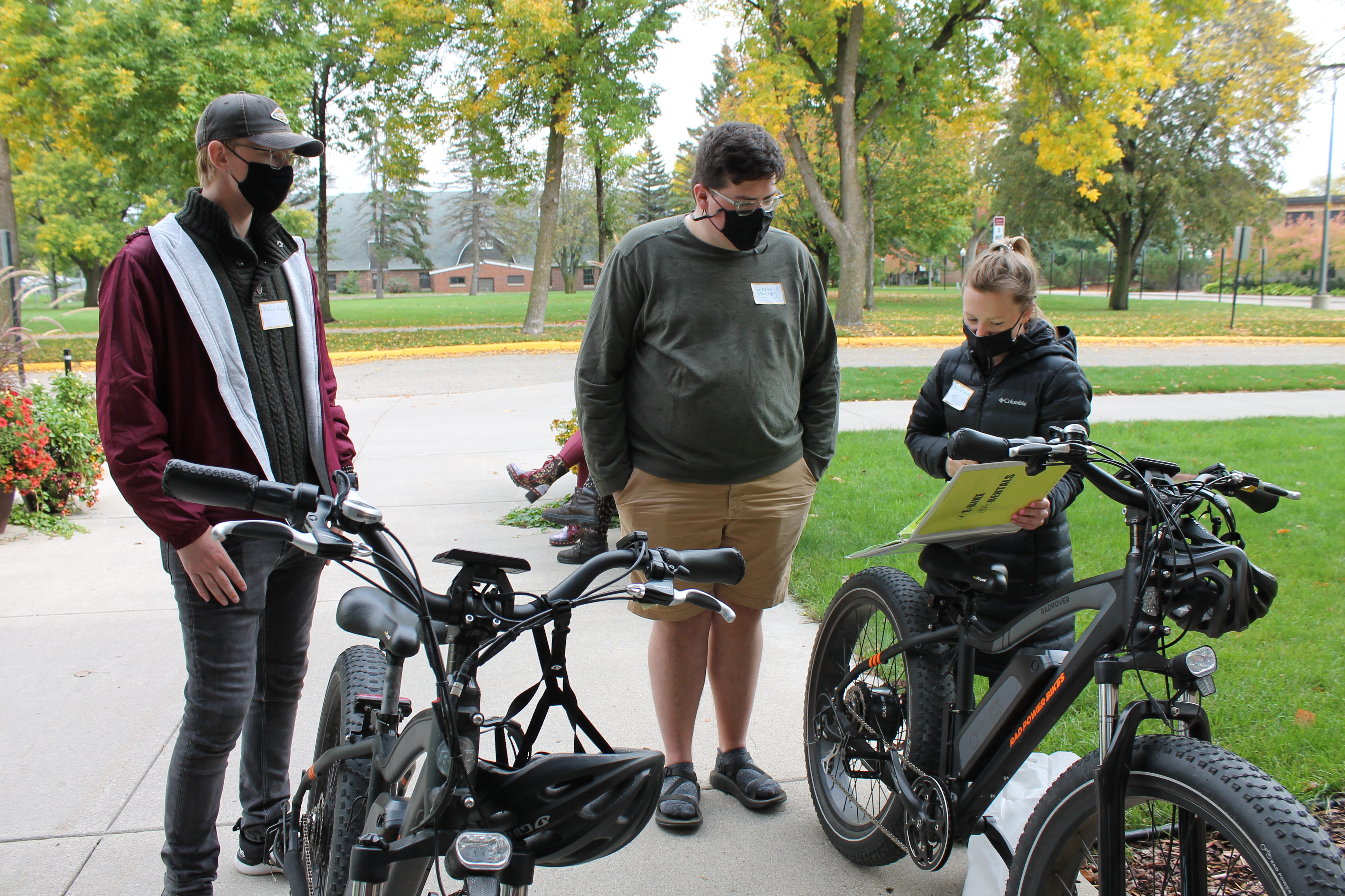 Clare Sorensen shows visitors how to use the e-bikes.