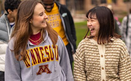 Students looking at each other and smiling