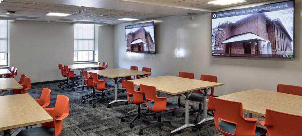 Classroom technology including multiple TVs and video conferencing equipment in a Blakely Hall classroom
