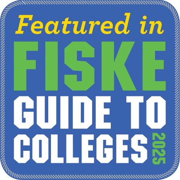 Blue square badge with rounded corners featuring text "Featured in FISKE GUIDE TO COLLEGES 2025" in bold green, white and yellow letters on a blue background.
