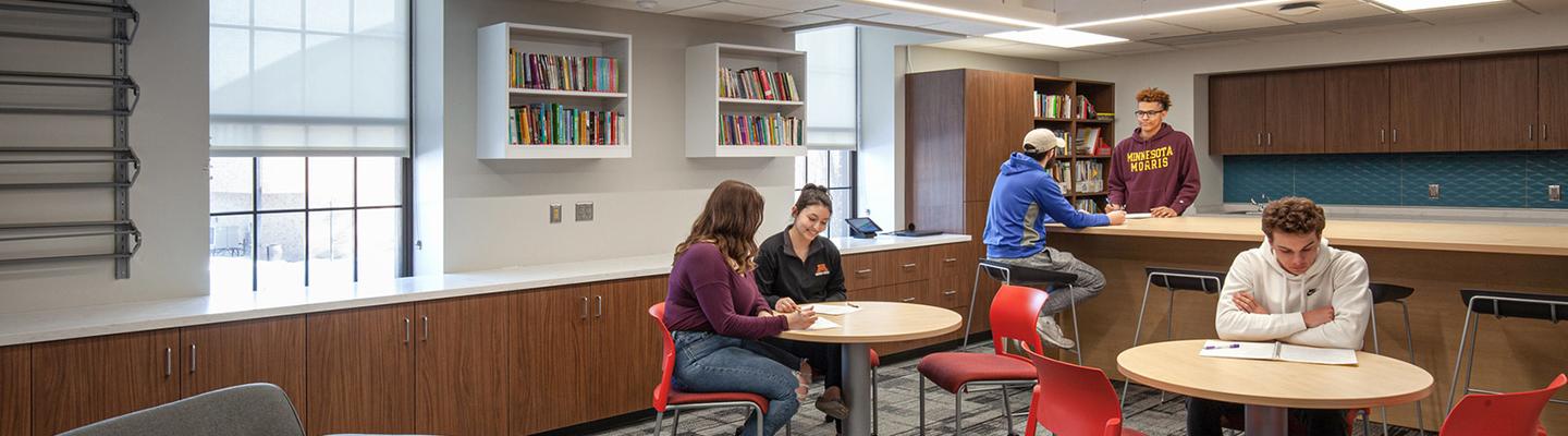 Several students work in a collaborative space in Blakely Hall.