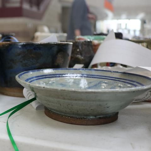 A table with several ceramic bowls 